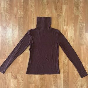 Dynamite turtleneck!